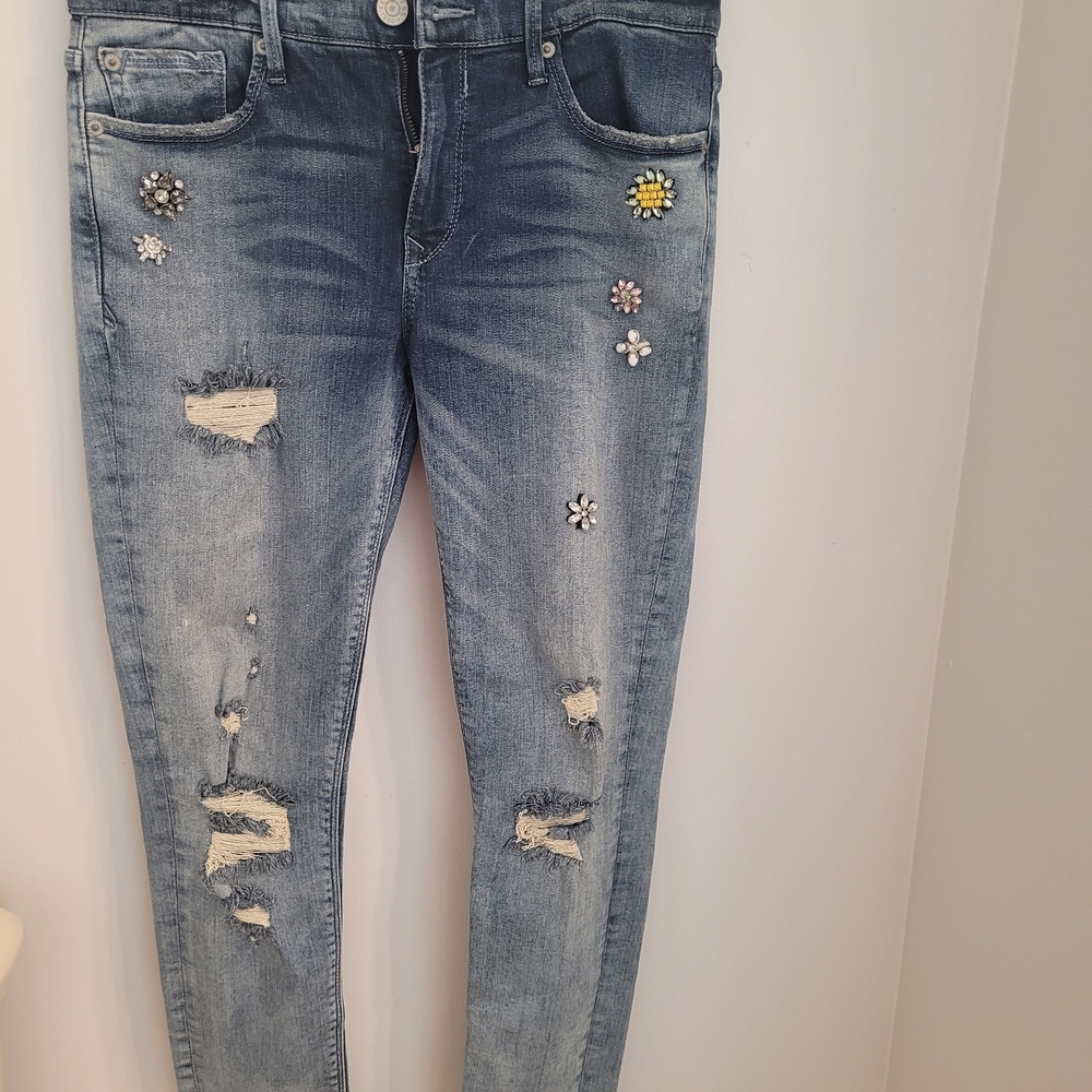 Express Distressed Blue Skinny Jeans with Floral Embellishments